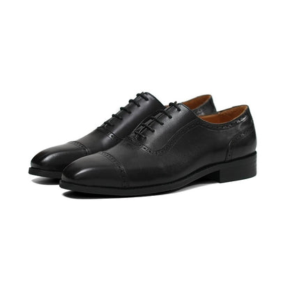 Lunepebbla cap-toe oxford shoes sole view showing fiddle-waist rubber outsole and Blake stitch