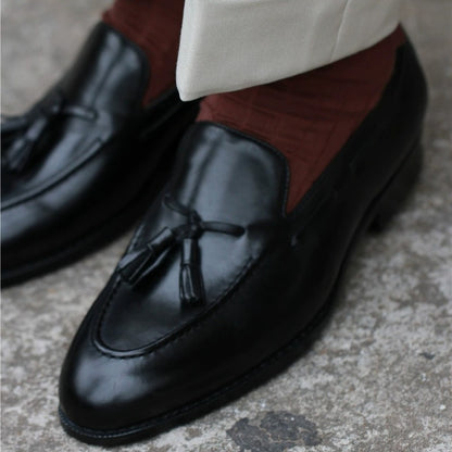 Lunepebbla brown leather tassel loafers side profile showing round toe and apron stitching